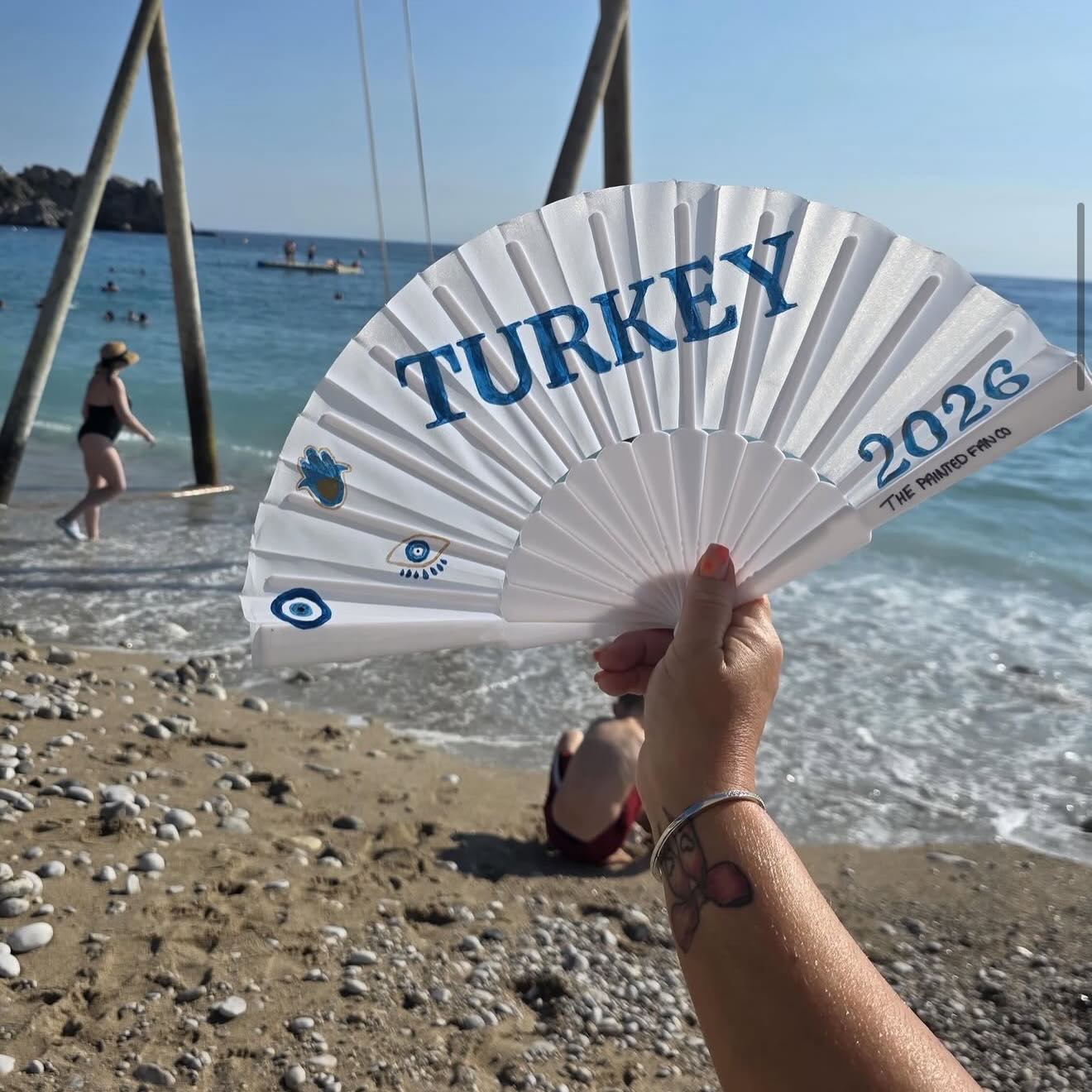 Hand-painted folding fan example